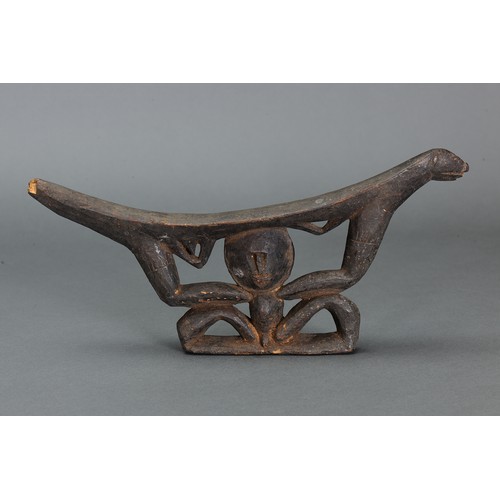60 - Early Abalem Headrest, Papua New Guinea. Carved and engraved hardwood. Aged squat figure supporting ... 
