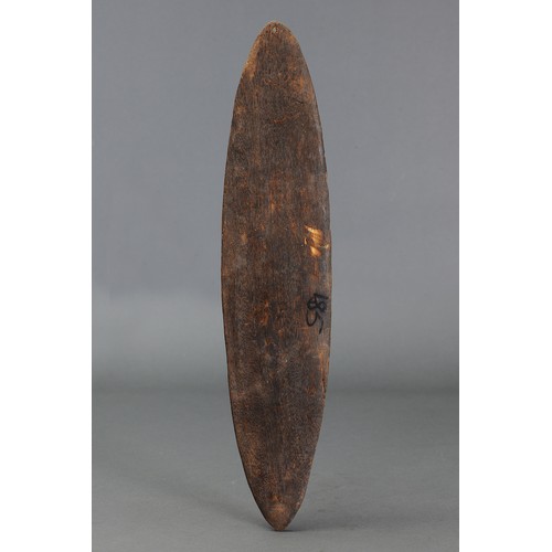 62 - Early Papuan Gulf Bullroarer Spirit Board, Papua New Guinea. Carved and engraved hardwood and natura... 