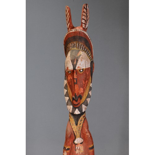 65 - Maprik Figure with large ears, Papua New Guinea. Carved and engraved hardwood and natural pigment. A... 