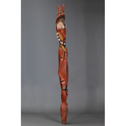 65 - Maprik Figure with large ears, Papua New Guinea. Carved and engraved hardwood and natural pigment. A... 
