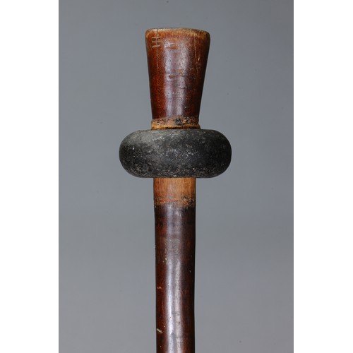 68 - New Britain Stone Headed Club, Papua New Guinea. Carved hardwood and stone. Club with stone head and... 