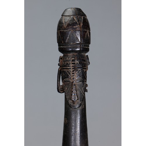 70 - Fine early Tami Island Sago Pounder, Papua New Guinea. Carved and engraved hardwood. Finely carved f... 
