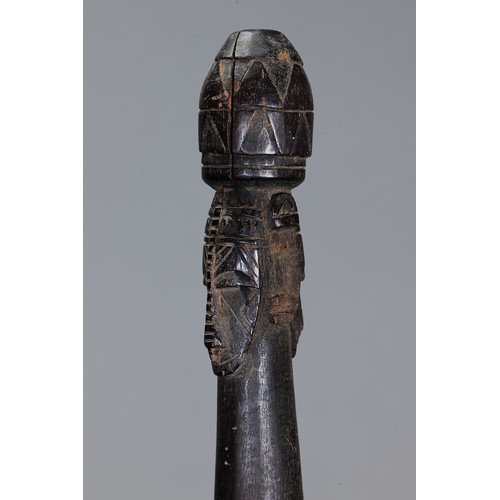 70 - Fine early Tami Island Sago Pounder, Papua New Guinea. Carved and engraved hardwood. Finely carved f... 