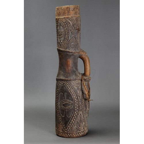 79 - Fine early Abelam Drum (Probably Stone Cut), Papua New Guinea. Carved and engraved hardwood and natu... 