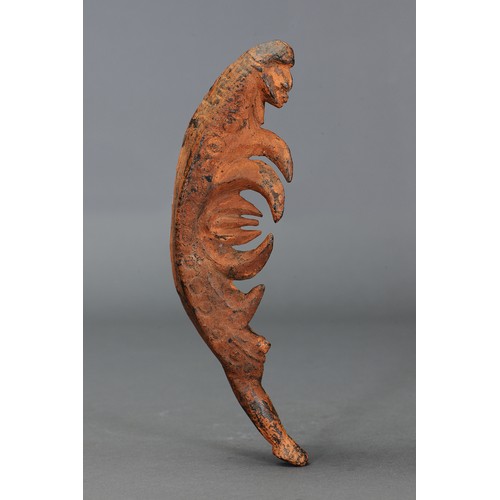 83 - Korewori Hook Figure / Charm, Papua New Guinea. Carved and engraved hardwood and natural pigment. Ap... 