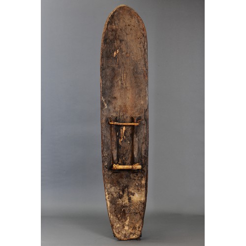 90 - Iatmul or Sawos Shield, Middle Sepik River, East Sepik Province, Papua New Guinea. Carved and engrav... 