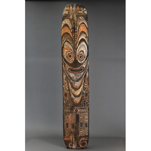 95 - Large Iatmul Shield, Papua New Guinea. Carved and engraved hardwood and natural pigment. Approx L175... 