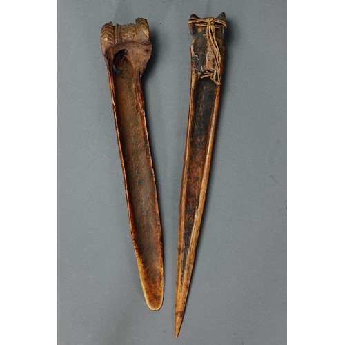 123 - Pair of Abelam and Kwoma Cassowary Bone Daggers, East Sepik Province, Papua New Guinea. Carved and e... 