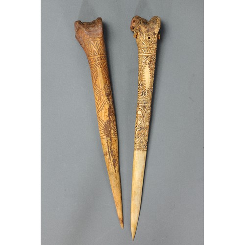 125 - Pair of Abelam Cassowary Bone Daggers, Yina, East Sepik Province, Papua New Guinea. Carved and engra... 