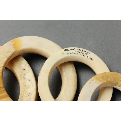 138 - A Collection of Four Fine Currency Shell Ring, Solomon Islands. Carved tridacna clam shell. Solomon ... 
