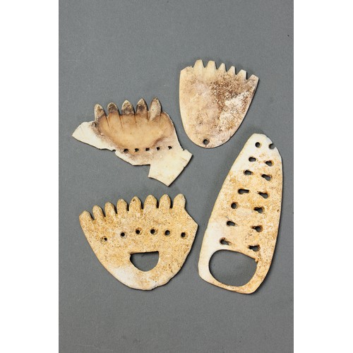 146 - A Collection of Four Ancient Barava Ornaments, Solomon Islands. Carved tridacna clam shell. These ca... 