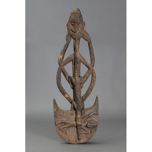 345 - Iatmul Openwork Suspension Hook Carving, Papua New Guinea. Carved and engraved hardwood. Approx L65c... 