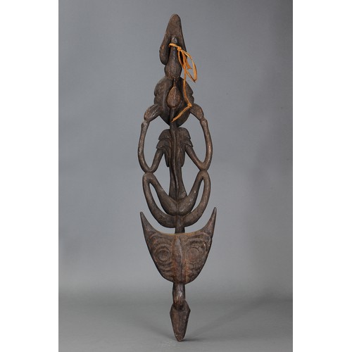 343 - Iatmul Openwork Suspension Hook Carving, Papua New Guinea. Carved and engraved hardwood and natural ... 