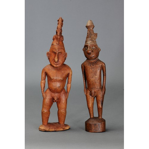 338 - Pair of Lower Sepik Figures, Papua New Guinea. Carved and engraved hardwood and shell eyes. Carved i... 