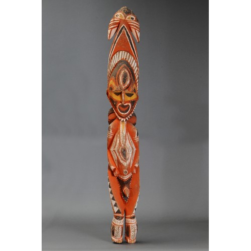 328 - Abelam Figure with birds adorning head, Maprik, Papua New Guinea. Carved and engraved hardwood and n... 