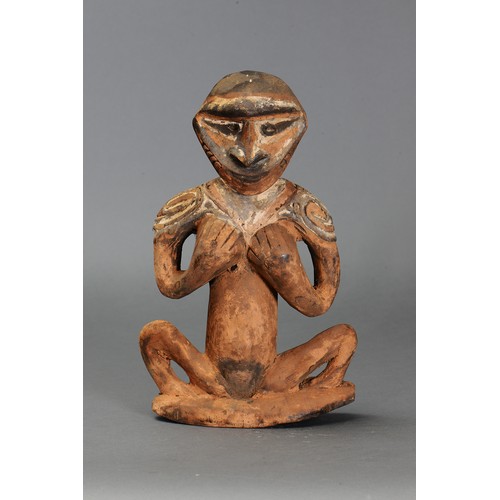 325 - Small Sepik Squatting Figure, Papua New Guinea. Carved and engraved hardwood and natural pigment. Ap... 