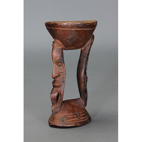 324 - Middle Sepik Hourglass Mortar, Papua New Guinea. Carved and engraved hardwood and natural pigment. A... 