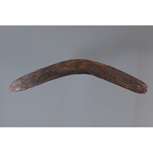 166 - Early Adzed Western Desert Boomerang, Western Australia. Carved and adzed hardwood. Of plano-convex ... 