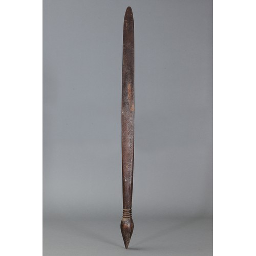 175 - FIGHTING Club, SOUTH EAST victoria. Carved and engraved hardwood. Approx L79cm. PROVENANCE John Mage... 