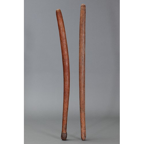 177 - Two Fine Early Pole Clubs, Western Desert/Central Australia. Carved and engraved hardwood and spinif... 