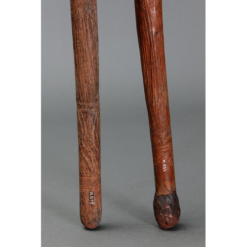 177 - Two Fine Early Pole Clubs, Western Desert/Central Australia. Carved and engraved hardwood and spinif... 