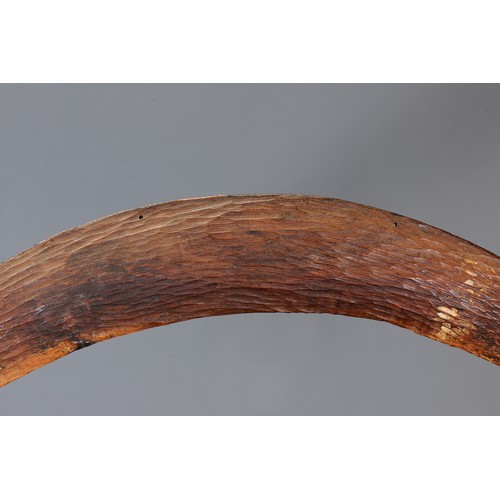 183 - Adzed Western Desert Boomerang, Western Australia. Carved and adzed hardwood. Of plano-convex sectio... 