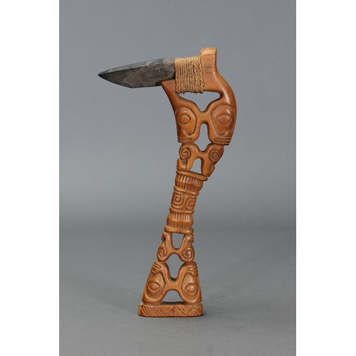 223 - Marquesan Adze with stone blade, Marquesas Islands. Carved hardwood with stone blade attached by nat... 