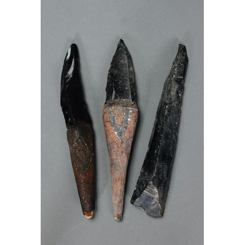 224 - A Collection of Three obsidian daggers, Admiralty Island. Obsidian, wood, nut paste and natural pigm... 