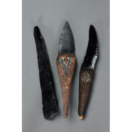 224 - A Collection of Three obsidian daggers, Admiralty Island. Obsidian, wood, nut paste and natural pigm... 