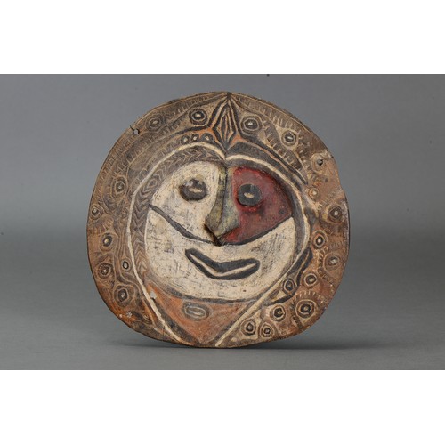 240 - Early Abalem Roundel, Papua New Guinea. Carved and engraved hardwood and natural pigments. Approx L2... 