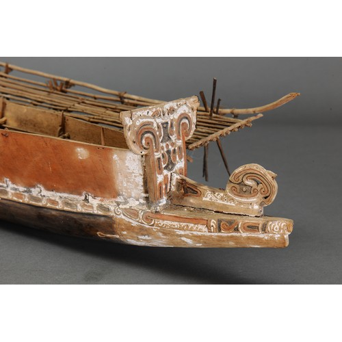 244 - Fine Massim Model Canoe, Trobriand Islands, Papua New Guinea. Carved and engraved wood, fibre and na... 