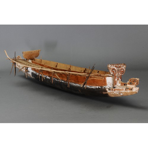 244 - Fine Massim Model Canoe, Trobriand Islands, Papua New Guinea. Carved and engraved wood, fibre and na... 