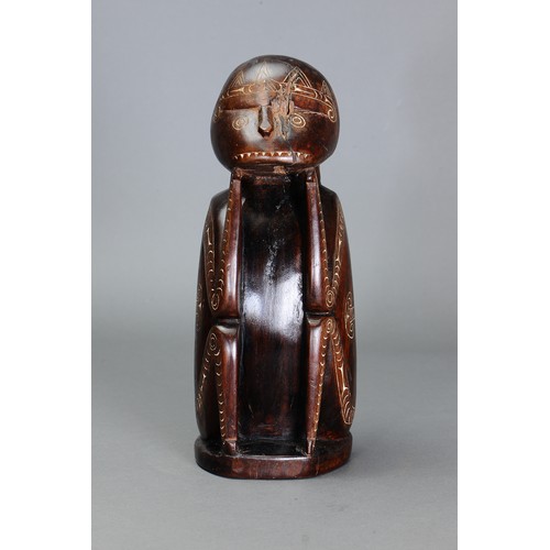 247 - Early Cherubic Massim Figure, Trobriand Islands, Papua New Guinea. Carved and engraved hardwood and ... 