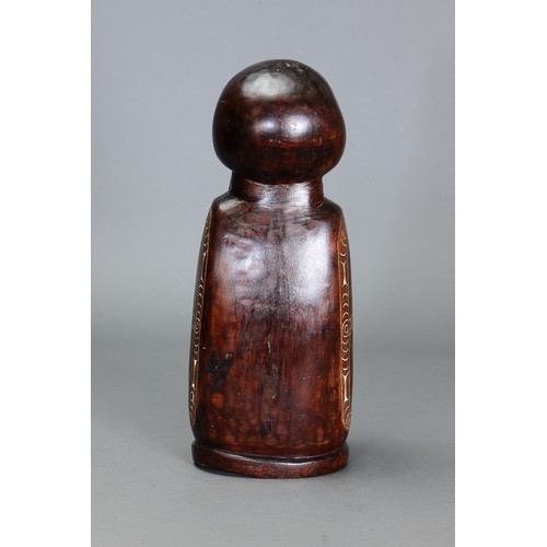 247 - Early Cherubic Massim Figure, Trobriand Islands, Papua New Guinea. Carved and engraved hardwood and ... 