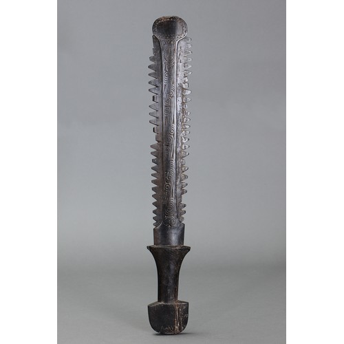 250 - Fine early Massim Saw Tooth Club with Facial Design, Trobriand Islands, Papua new Guinea. Carved and... 