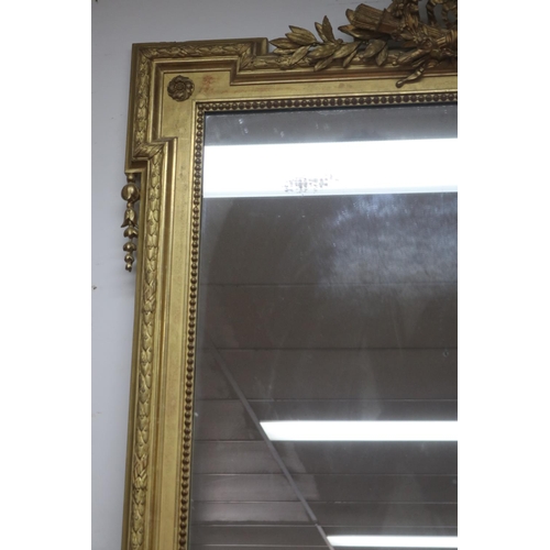 1003 - Fine antique 19th century French gilt surround salon mirror, elaborate crest with crossed torch and ... 
