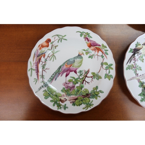 1027 - Set of four Portuguese plates, after the antique 1765 examples, painted with exotic birds, each appr... 
