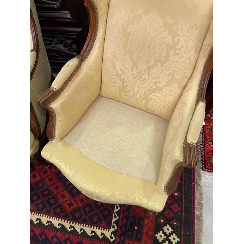 1165 - Pair of French Louis XV style wingback cream upholstered armchairs, each approx 95cm H x 70cm W (2)