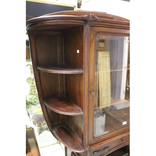 1168 - Antique French Art Nouveau carved walnut cabinet, open shelf base, with single long drawer below a c... 