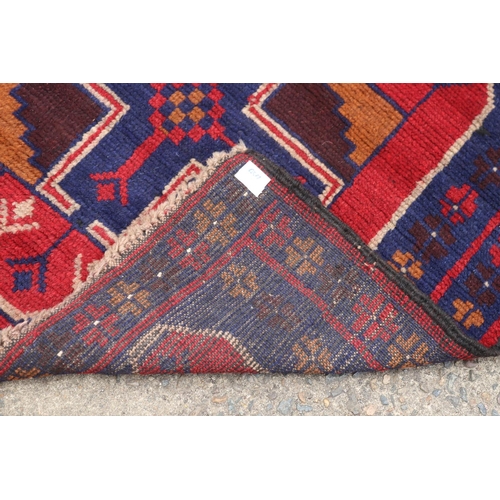 1175 - Handknotted pure wool Persian baluchi, approx 75.5cm x 292cm