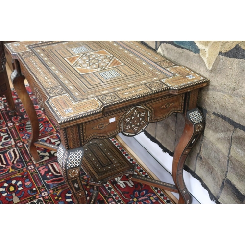 1189 - Traditional Moroccan inlaid table with matching armchairs, well appointed inlay, table approx 78cm h... 