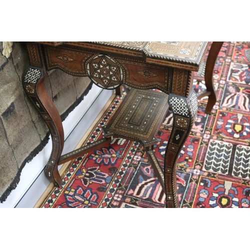 1189 - Traditional Moroccan inlaid table with matching armchairs, well appointed inlay, table approx 78cm h... 