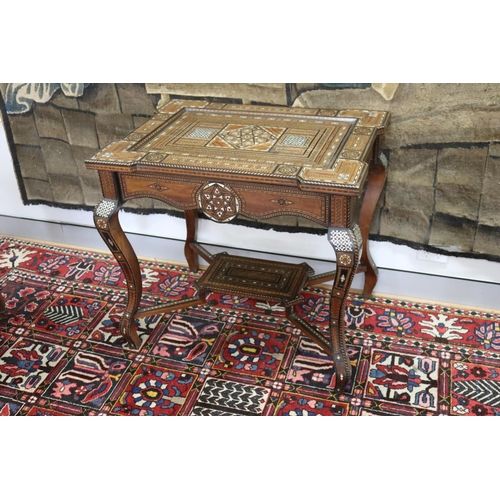 1189 - Traditional Moroccan inlaid table with matching armchairs, well appointed inlay, table approx 78cm h... 