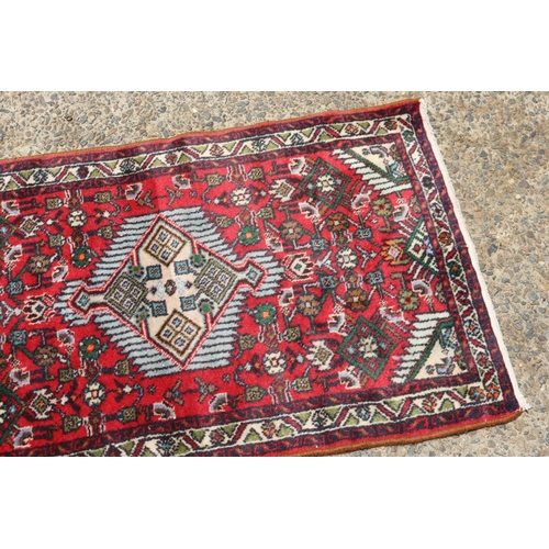 1191 - Persian hand knotted wool carpet, approx 64cm x 104cm