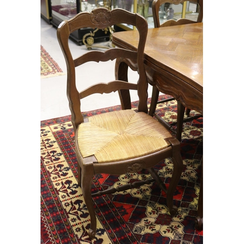 1198 - Six vintage French Louis XV style oak ladder back chairs, with drop in rush seats (6)