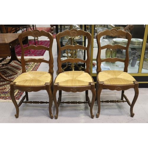 1198 - Six vintage French Louis XV style oak ladder back chairs, with drop in rush seats (6)