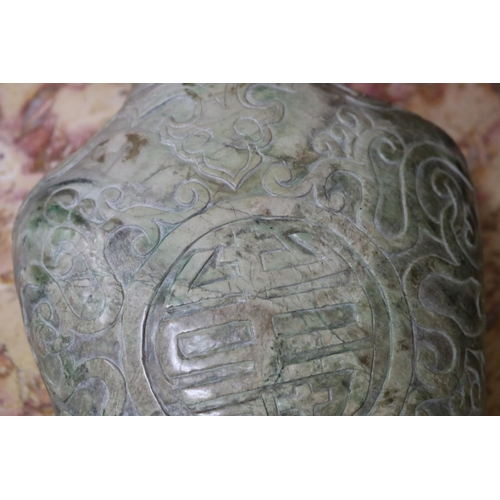 1202 - Chinese archaistic rustic green jade vase, carved in low relief, showing signs of natural cracking, ... 