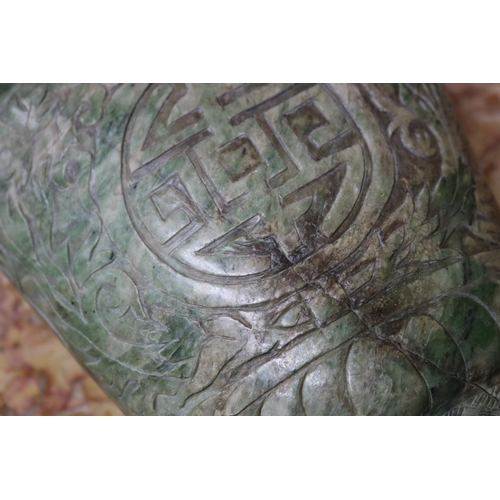 1202 - Chinese archaistic rustic green jade vase, carved in low relief, showing signs of natural cracking, ... 