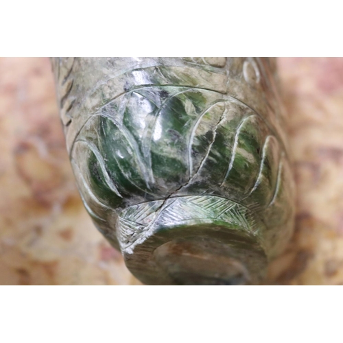 1202 - Chinese archaistic rustic green jade vase, carved in low relief, showing signs of natural cracking, ... 