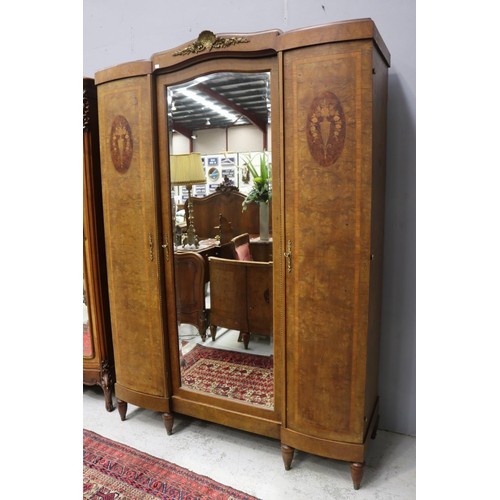 1276 - Vintage French three door armoire, with central mirrored door, marquetry urn decoration to either si... 